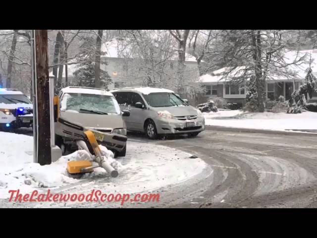 Vehicle skids and takes out Traffic light