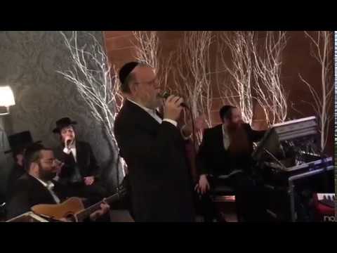 Michoel schnitzler singing at a beautiful shave bruchis with the shira choir mendy h. & Yanky Ketina