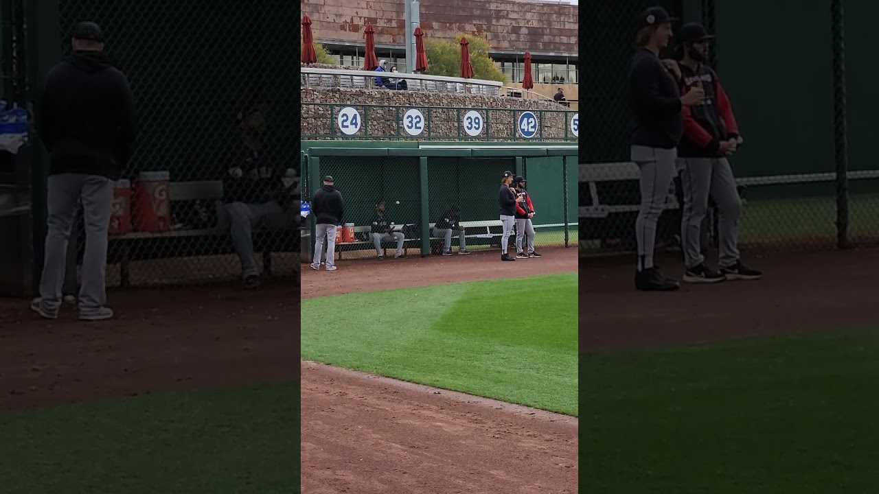 Juggling with the Guardians' Xzavion Curry at Camelback Ranch