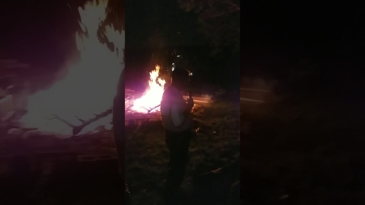 Rabbi Baruch Brull storytelling at a Bonfire