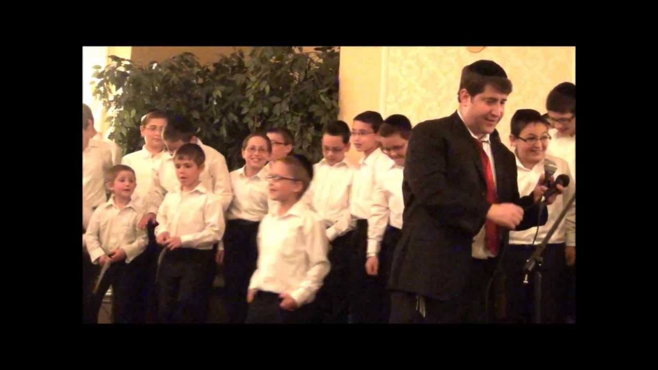 Raw Footage. A school parent leads school choir! Composed and conducted by Rabbi Benzion Klatzko