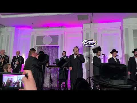 Lipa Schmeltzer, Motty Rosenfield, YY Bluming production at wedding in Montreal