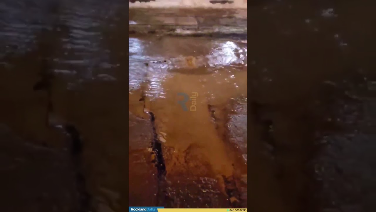 Water main break occurred at 4 Eisenhower Avenue in New Square causing flooding along the street.