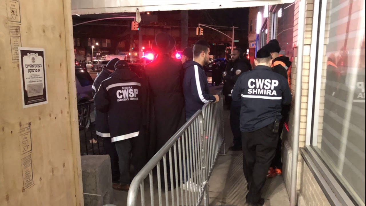 CWSP Shmira securing thousands for 8 days of Chanukah, lighting the Menorah with the Skulen Rebbe
