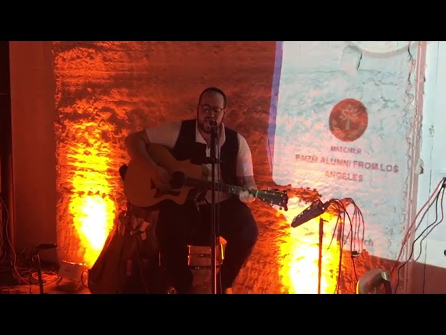 Moshe Groner jamming at a fundraiser.