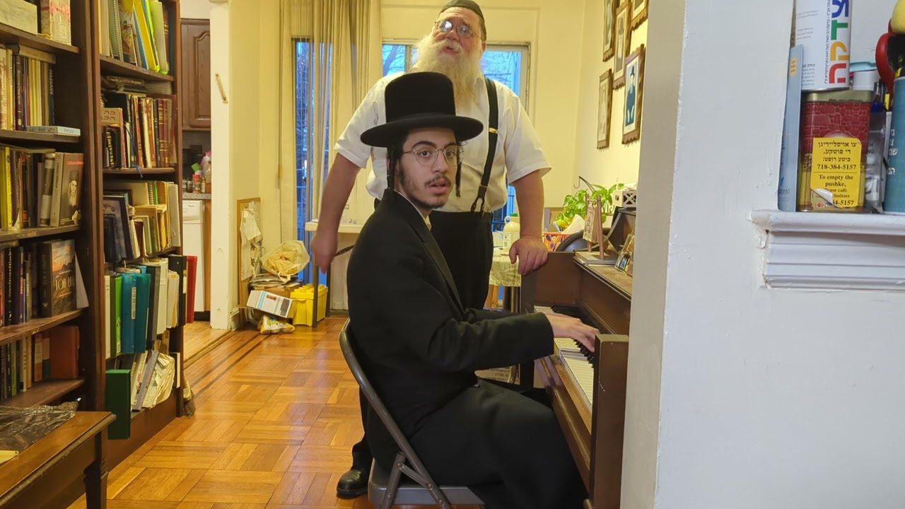 World pianist Yossi Pechenik at Dalfin Chanuka celebration 2024 - Rabbi Chaim Dalfin