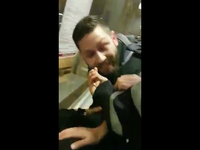 police with a man who allegedly did not pay Jerusalem light rail fare