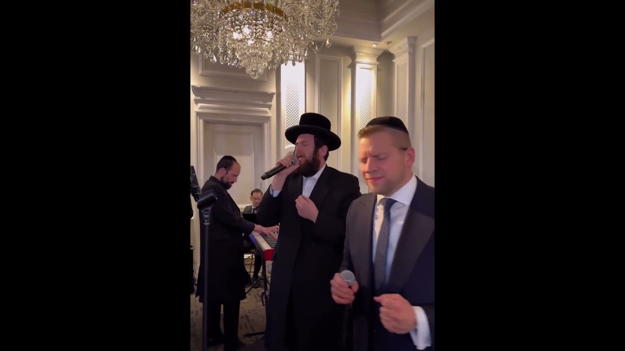 Mordechai Shapiro and Shmueli Unger with Freilach Band