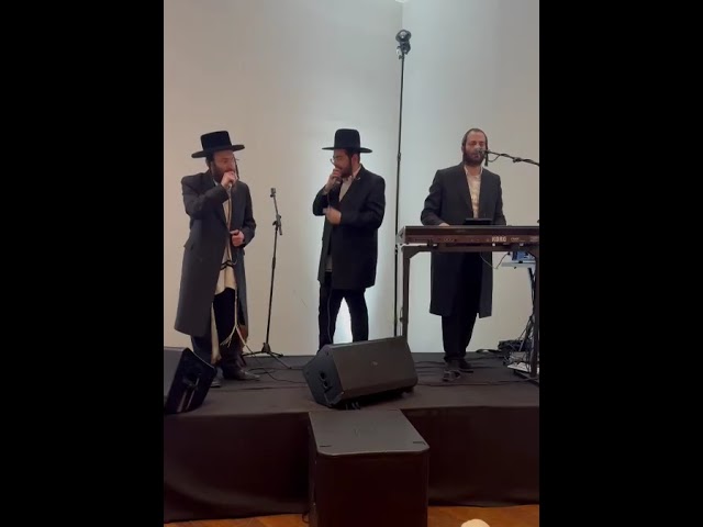 Hershy Weinberger and Duvid Berger with Yumi Gelb