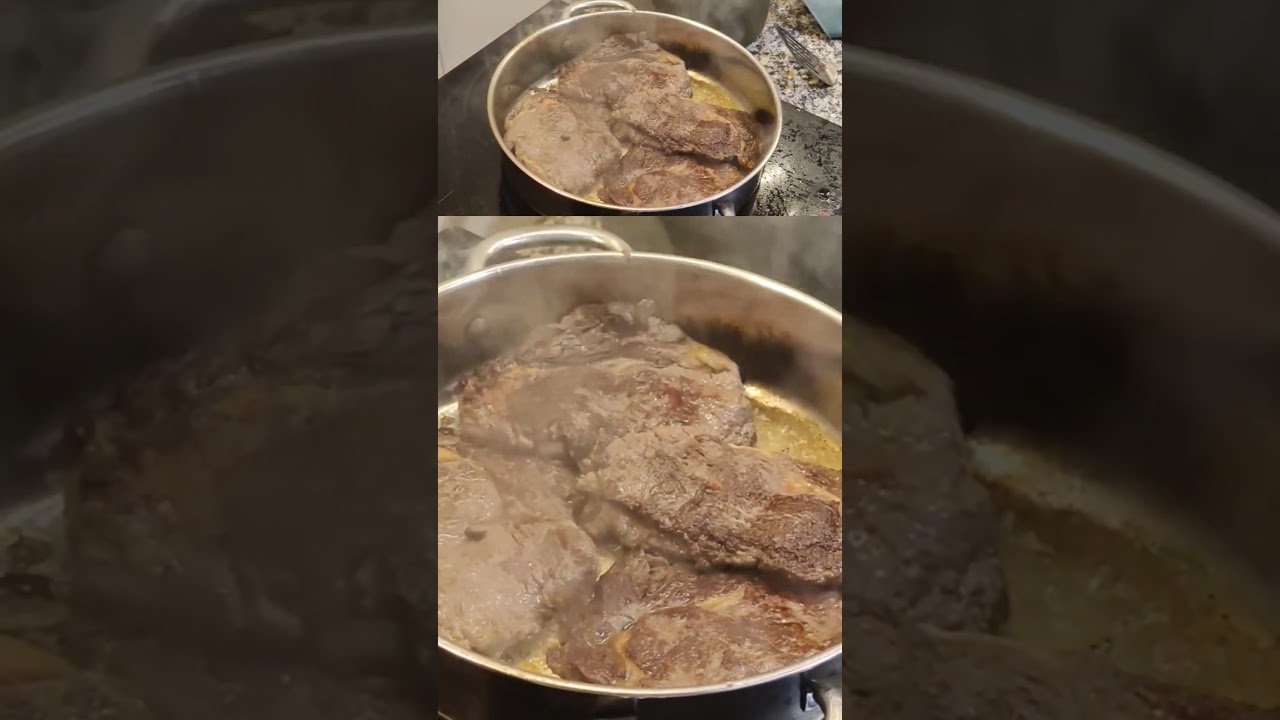 Steaks sizzling in an Ikea 365 pan.