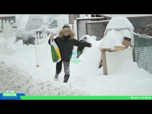 Residents Shovel Their Cars Out From Under Heavy Layers of Snow
