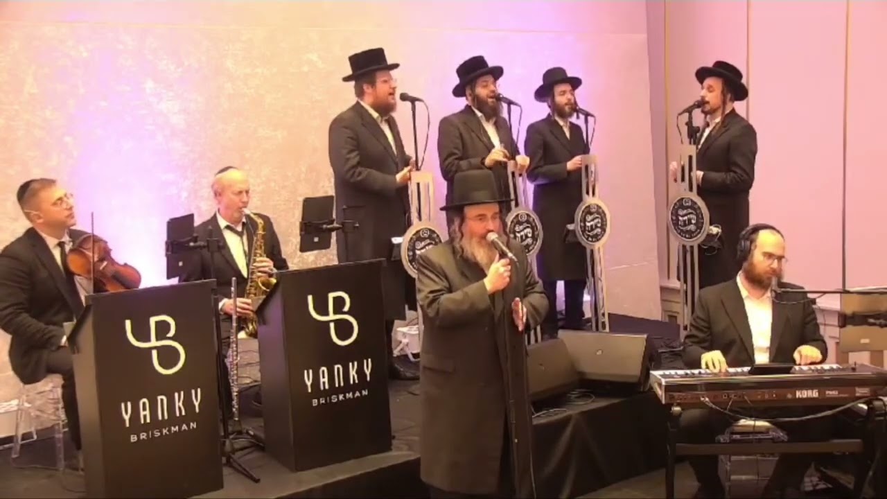 סיום עם אייזיק האניג ומקהלת שירה ותזמורת של יענקי בריסקמן