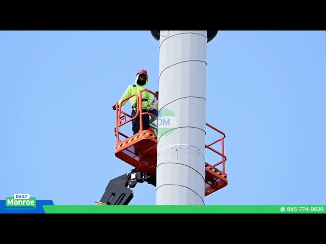 Repairs are underway on the telephone service tower on Route 208.
