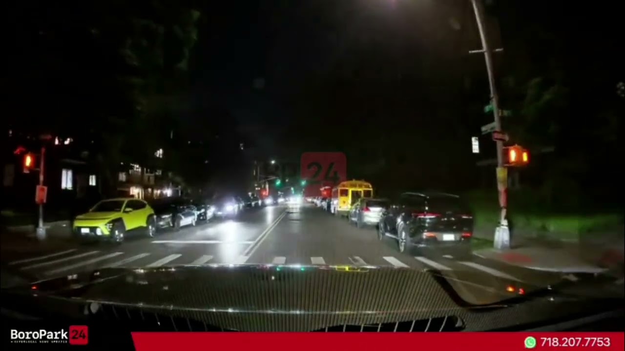 WAIT FOR YOUR LIGHT: Pedestrian suddenly runs into traffic at night, nearly causing serious crash.
