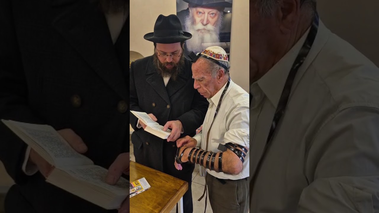 Holocaust Survivor Puts on Tefillin in Rome's Jewish Ghetto