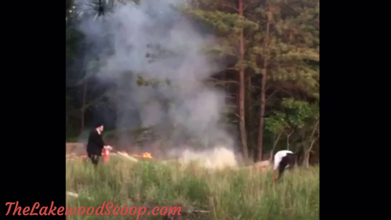 Residents use fire extinguishers to put out brush fire