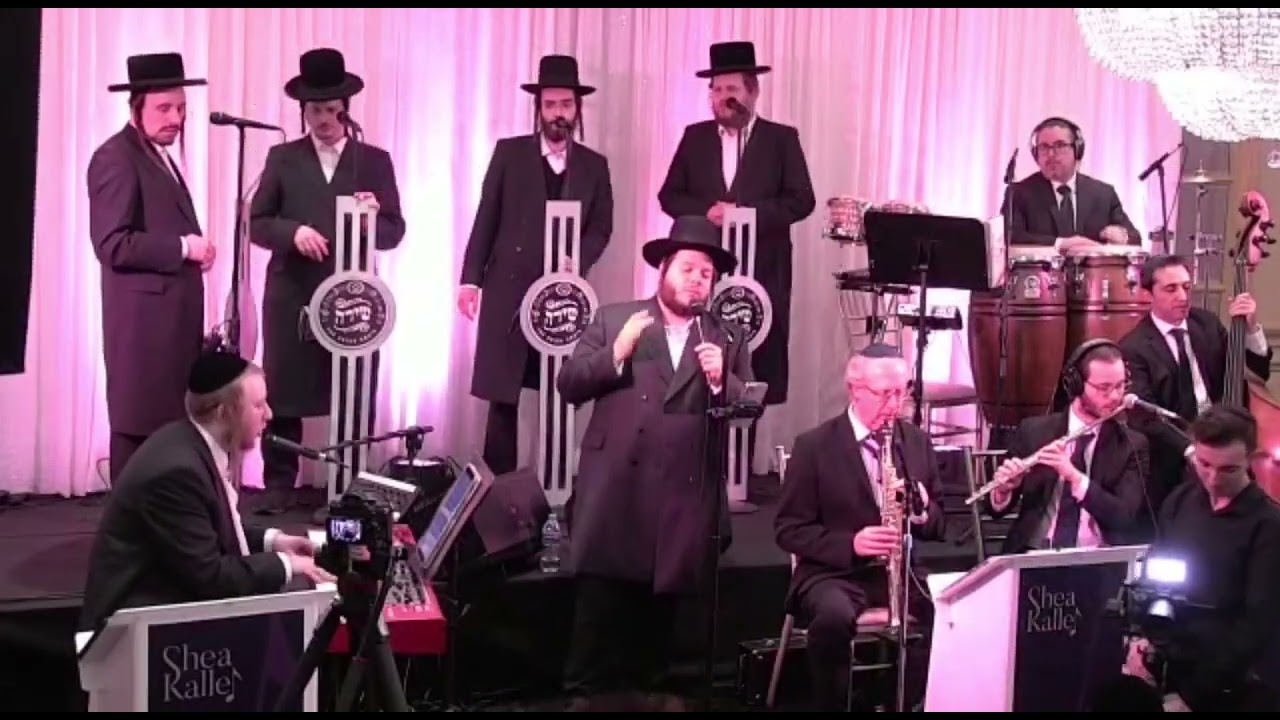 לוי פאלקוביץ שר מיכאל שניצלער עם מקהלת שירה ותזמורת של שייעה קאלר