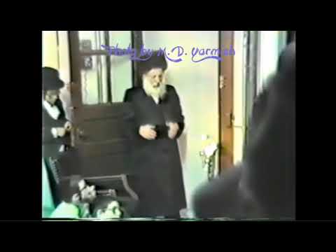 Skulener Rebbeim by the Chanukah Menorah - From the MD Yarmish Collection