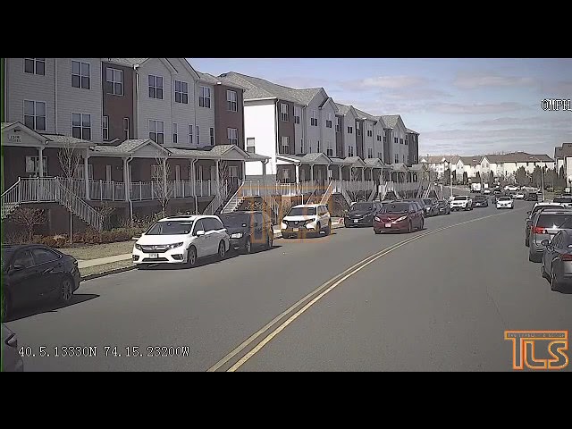 Car passes school bus nearly striking child