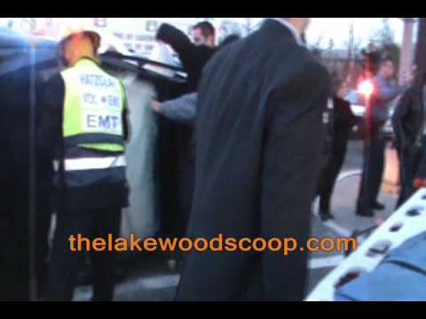 Overturned Vehicle Extrication-Officers Turning Car Back Over