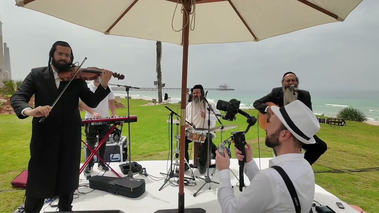 שרוליק לפקוביץ & יוסף קרדונר בחופה על הים yusaf kardoner & shrulik lifkovitz