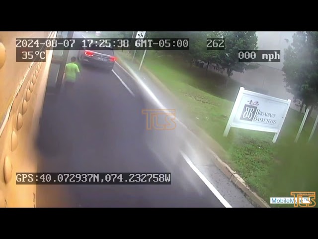 Child nearly struck by vehicle while getting off school bus