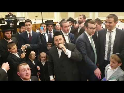 Lipa Schmeltzer at wedding in Belgium.