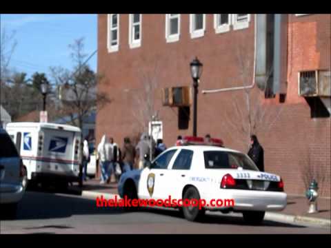 Police Moving Day Laborers from Clifton Avenue