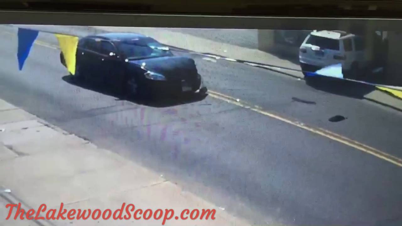 Surveillance video shows vehicle slamming into building