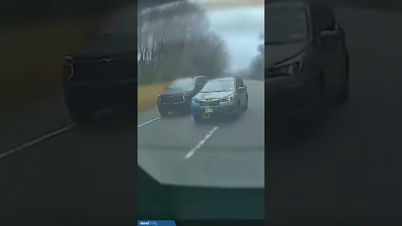 Driver changing lanes without checking the blind spot on the GSP, nearly causing a crash.
