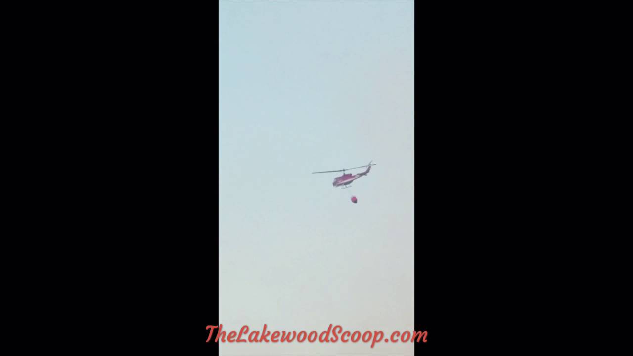 Chopper pulling water for forest fire Fort Dix