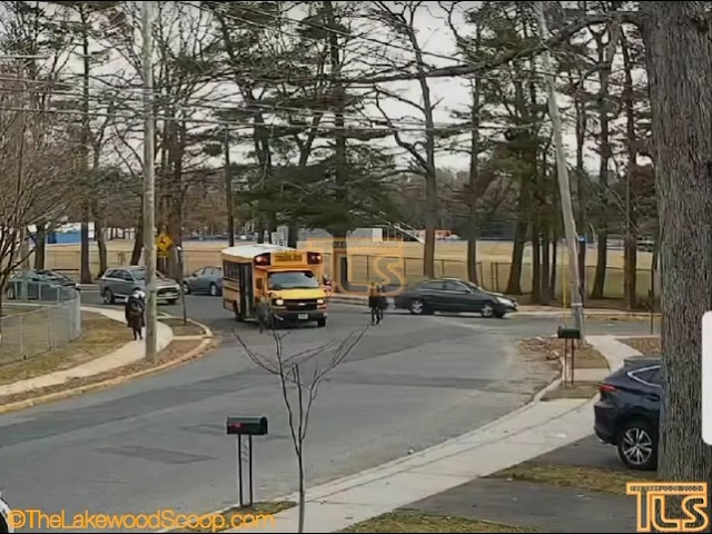 Close call when a car passes a school bus