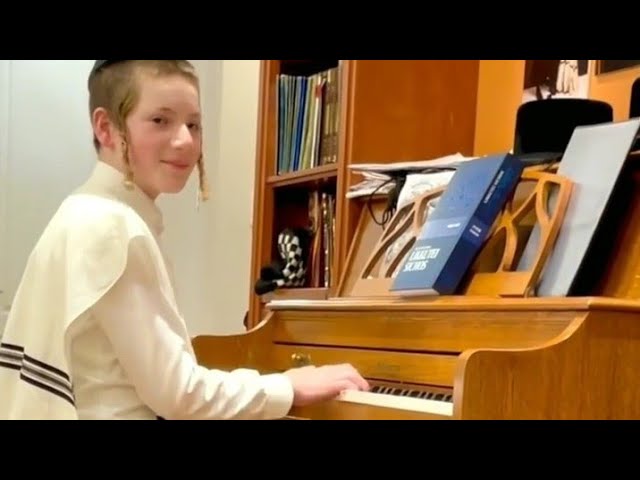 Cantor Yanky Lemmer Singing While His Son Plays On the Keyboard