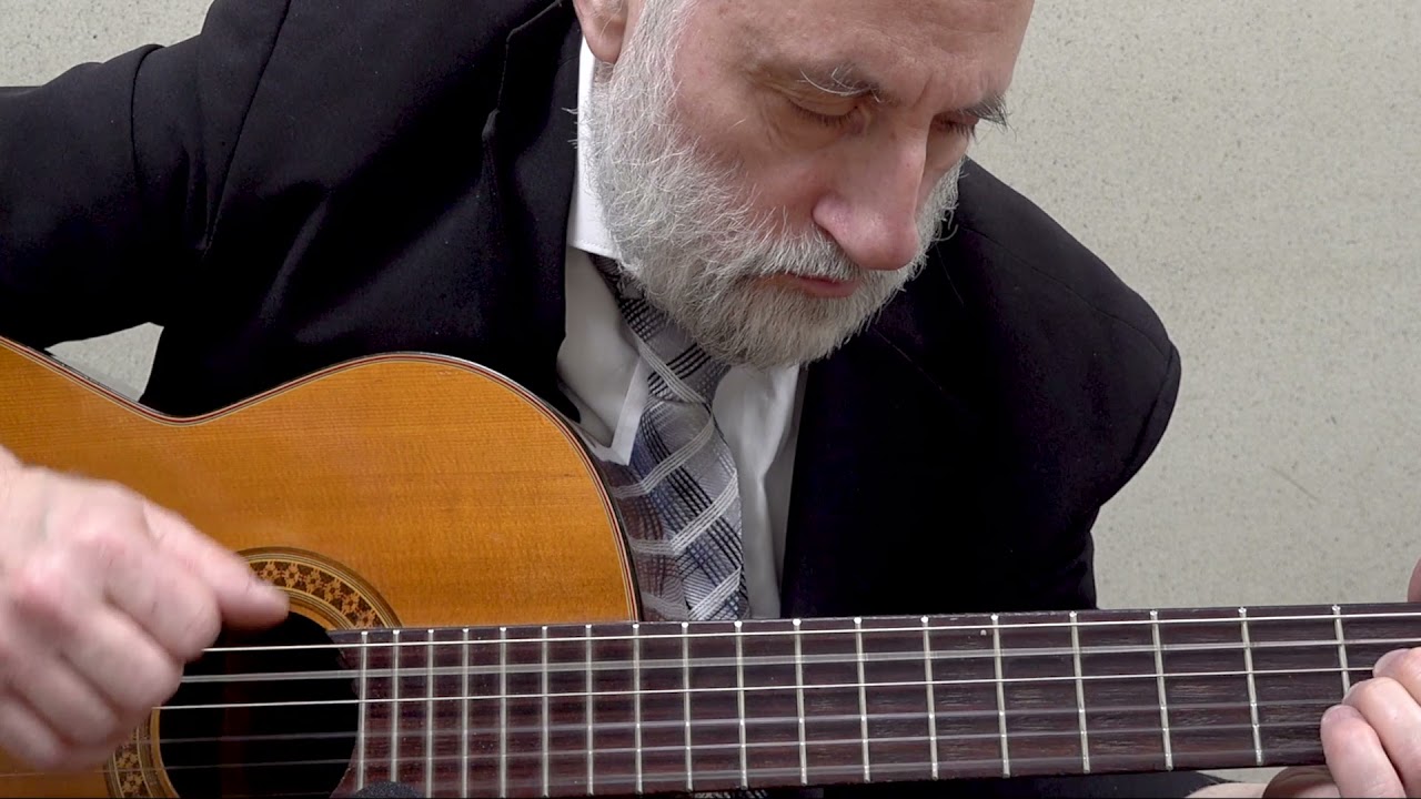 Vhi Sheamda Composed by: Yonatan Razel.  Arranged for the classical guitar by Yaakov Kranz.