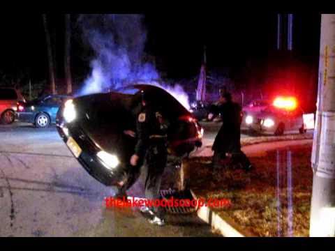 Cop and Hatzolah member turning over vehicle after mva
