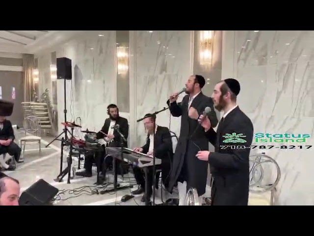 Shaya Solomon on drums, Sruly Reiss duet with one of the Feig brothers.