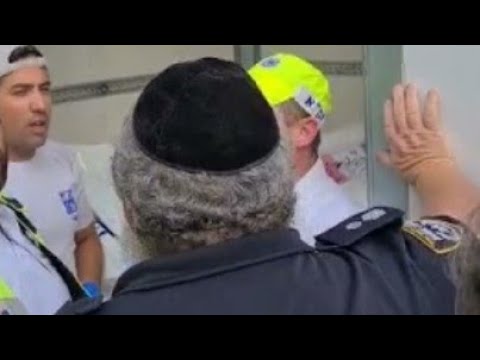 Police Officer Saying Kaddish For The Nifturin From Meron Stampede, Before Leaving Meron