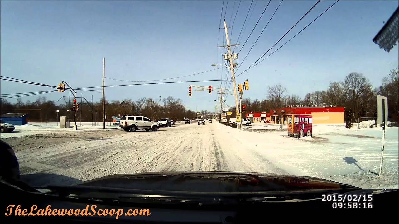 Dashcam SUV Fishtails in Snow in Lakewood