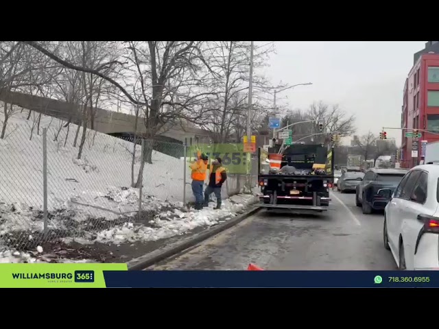 DOT crews are repairing the damaged fence at the Flushing Avenue after a vehicle crashed