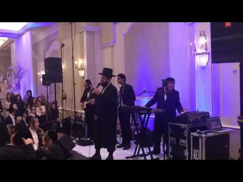 Avrumi berko with yisroel werdger by a wedding
