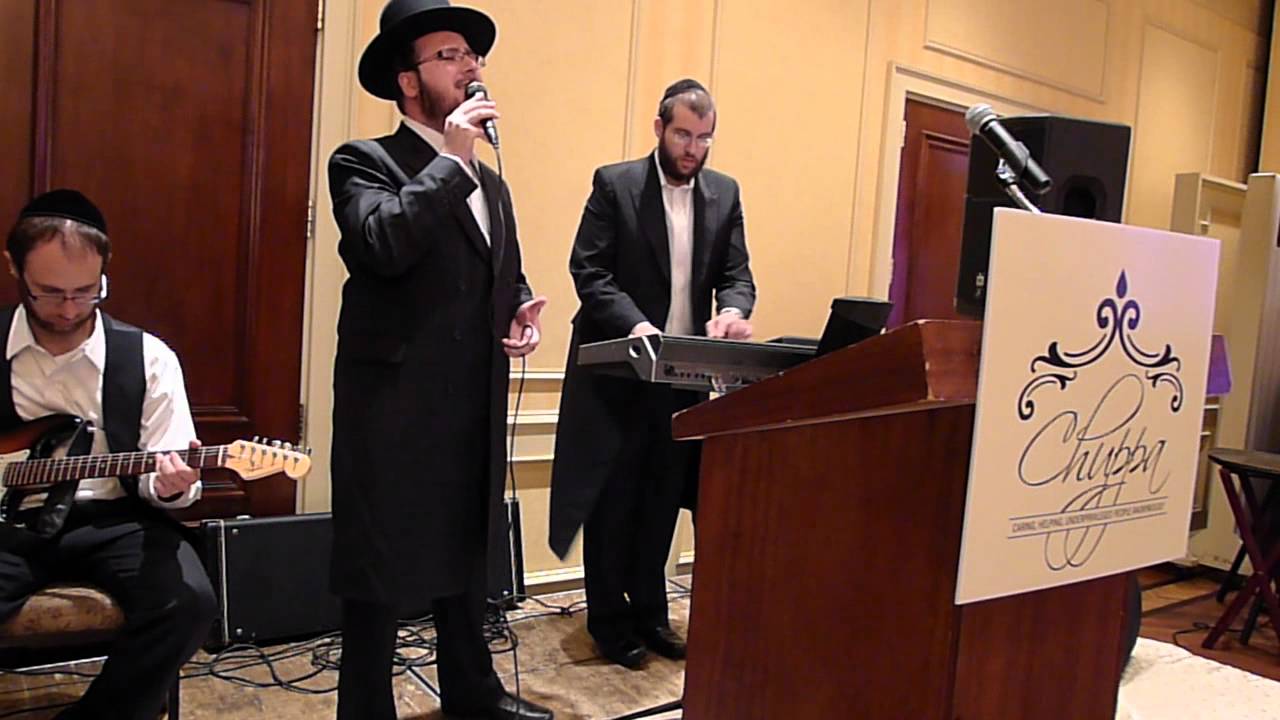Yoeli Greenfield singing at "CHUPPA" fundraiser event