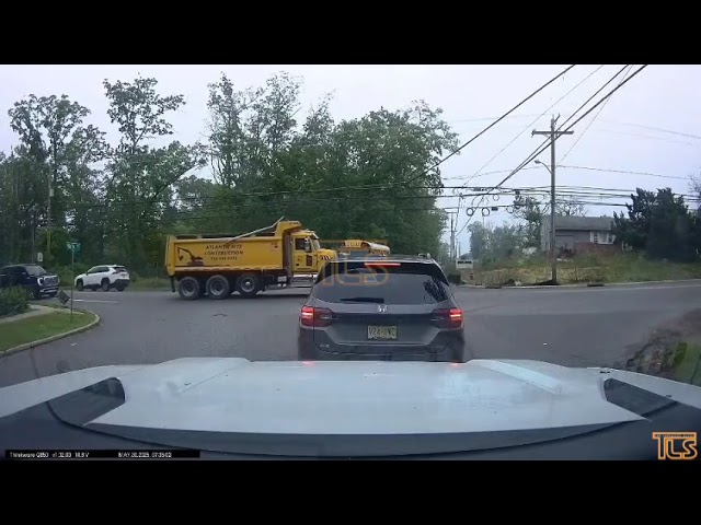 Dashcam footage of accident involving construction truck