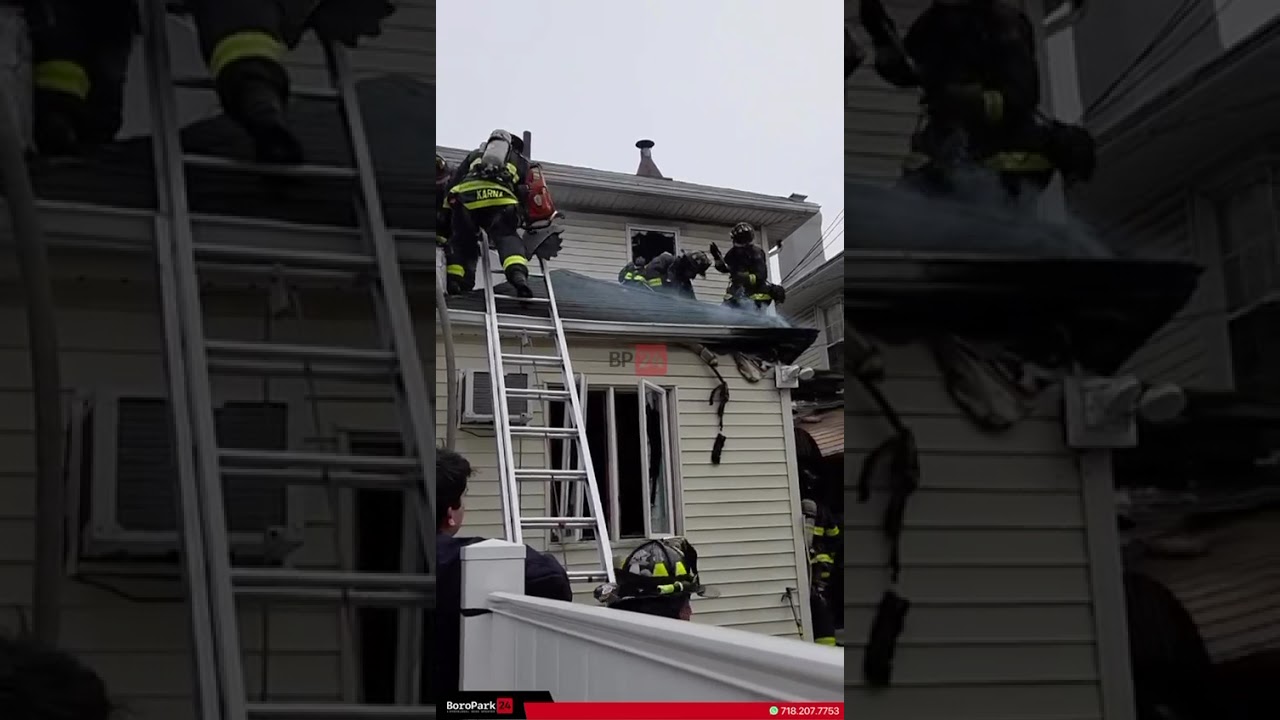 Firefighters at the scene of a house fire at 59th Street and 21st Avenue.