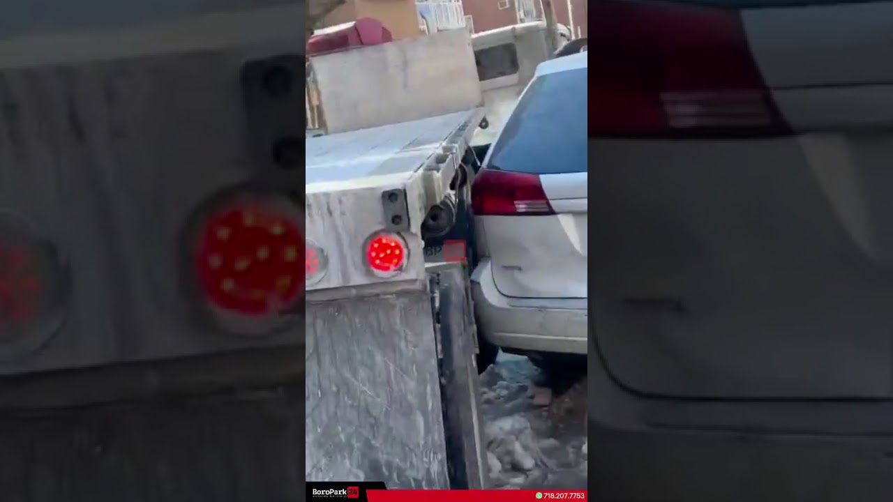 Tractor trailer got stuck while attempting a wide turn