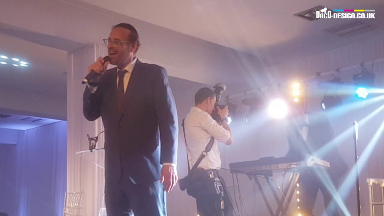 Yeedle Werdyger singing at Avi Kahn's (son of Moga) Bar Mitzvah, London (from cellphone)