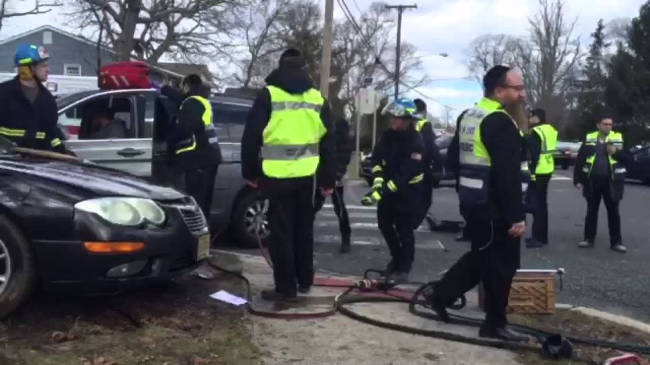 Extricating patient after crash on County Line