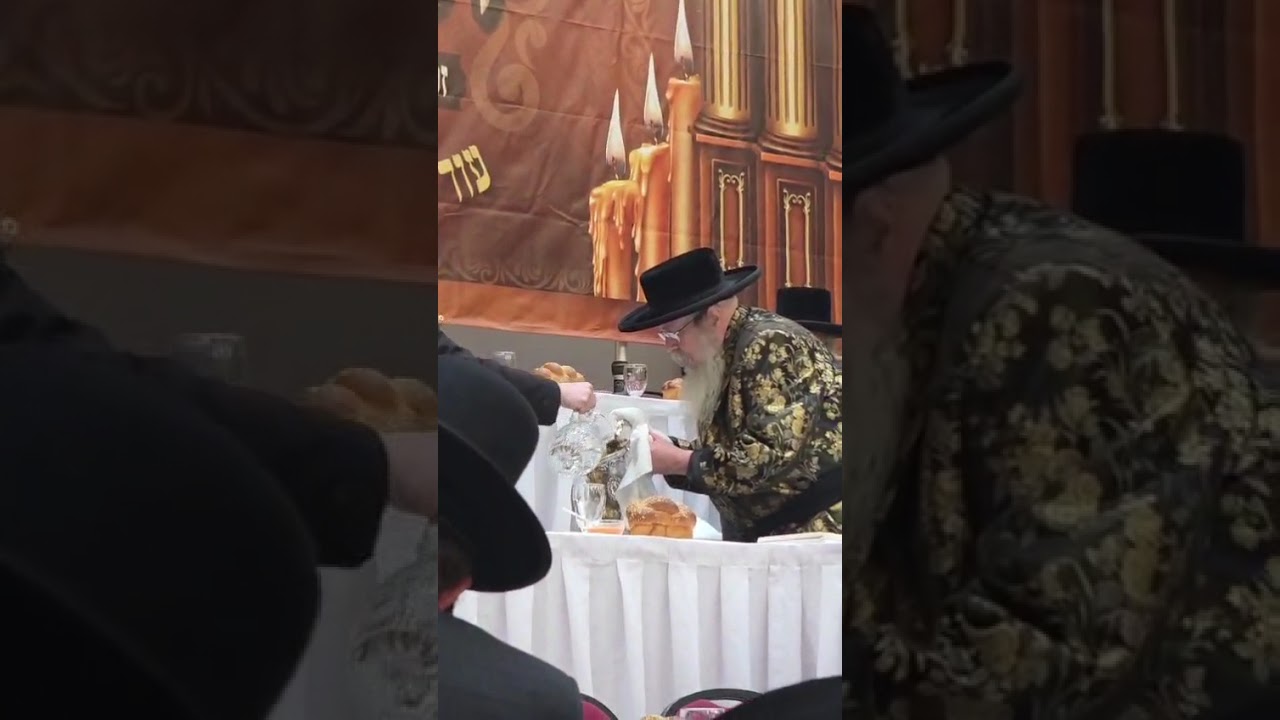 Tosh Rebbe washing his hands