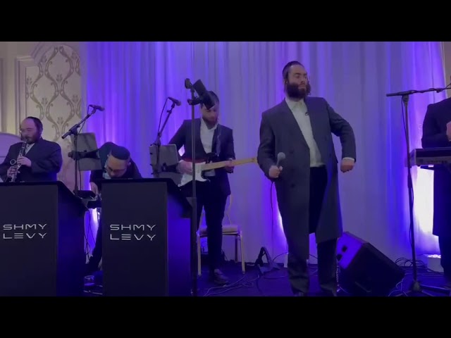 שמעיה פישר עם התזמורת של שמעי לעווי