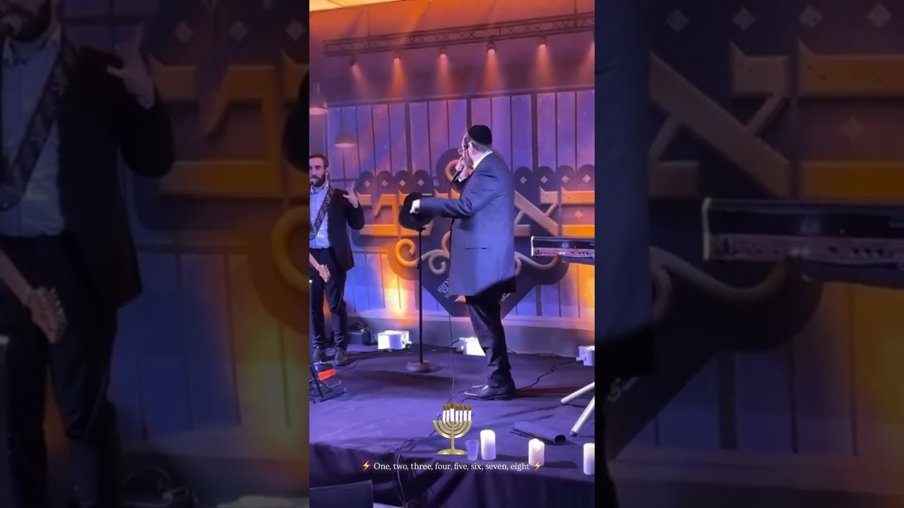 הערשי ויינברגר עם יענקי בריסקמן