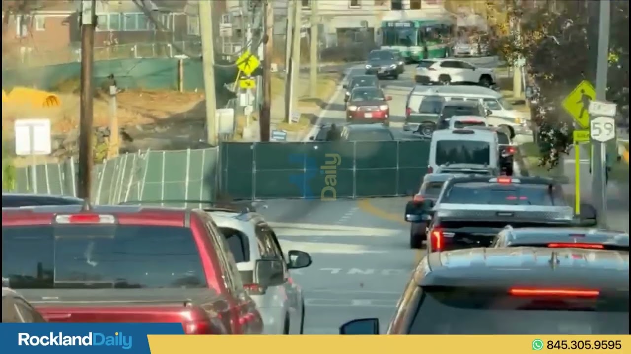 A construction gate swung open on Route 59 near Finkelstein Memorial Library on Sunday afternoon